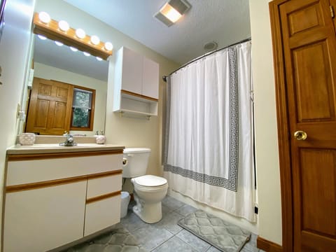 Combined shower/tub, hair dryer, towels, soap