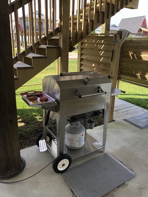 Propane grill provided downstairs.