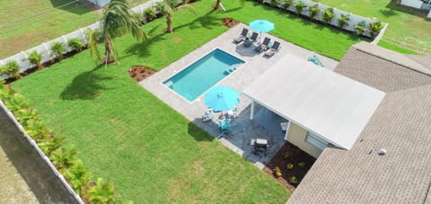 A heated pool, sun loungers