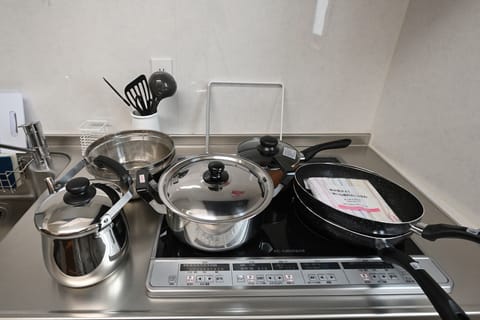 Fridge, microwave, stovetop, cookware/dishes/utensils