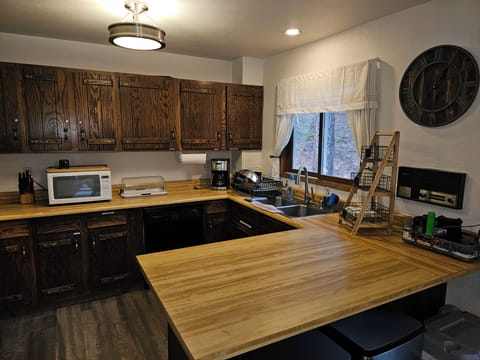 Huge peninsula is a great prep space, and also for serving meals buffet-style!