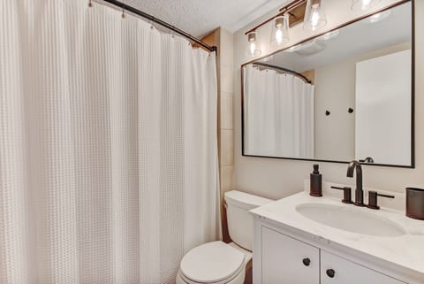 Combined shower/tub, hair dryer, towels, soap