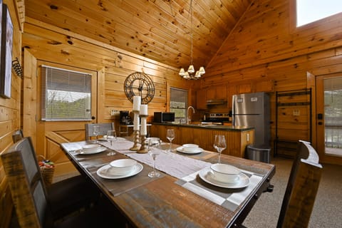 the dining area is convenient to the full kitchen