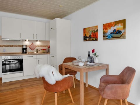 Table, Property, Furniture, Comfort, Wood, Interior Design, Orange, Lighting, Chair, Living Room