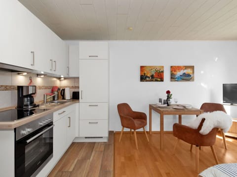 Furniture, Cabinetry, Countertop, Building, Wood, Table, Chair, Interior Design, Floor, Flooring