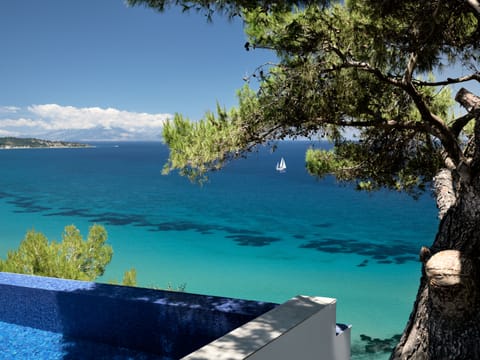 Outdoor pool, a heated pool, sun loungers