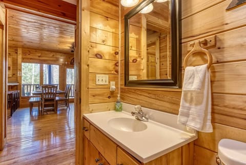 Half bath with laundry off of living area 