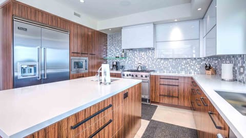Sleek modern kitchen with high-end Viking appliances and stylish finishes.