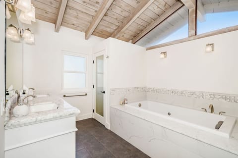 Bathtub, eco-friendly toiletries, bidet, towels