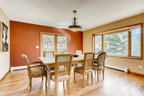 Dining table expands to seat 12. French doors open to deck overlooking river/mtn