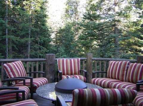 Huge outdoor gas fire pit on deck, with gas grill