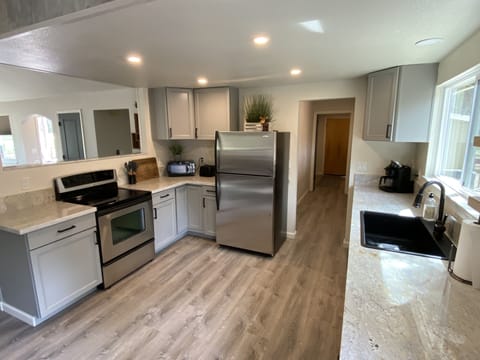 Kitchen with new appliances. Updated 8/2024