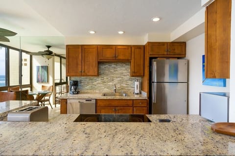 Kitchen with granite and newer appliances