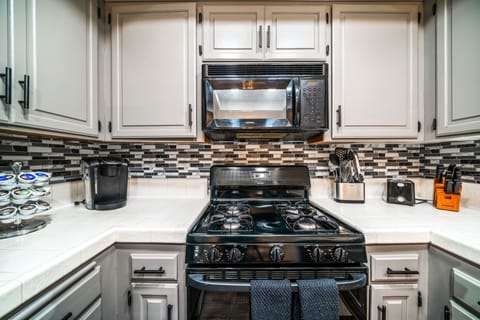 Mornings are covered with a Keurig coffee machine and Starbucks walk away!