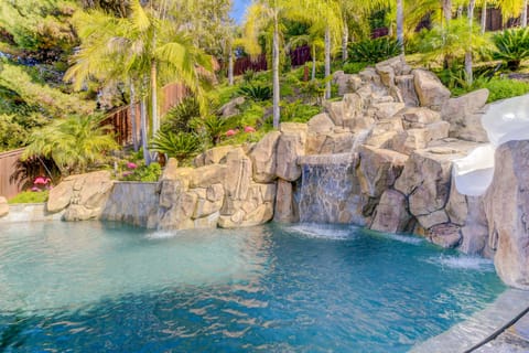 Enjoy the roaring waterfall and 20' slide in our 8' deep saltwater pool.
