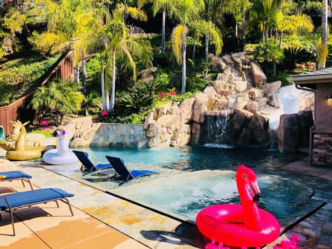 Enjoy the gorgeous backyard and take in the pool views and landscape.