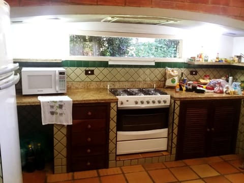 Fridge, microwave, oven, cookware/dishes/utensils