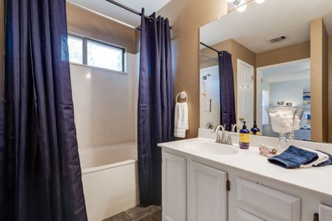 Combined shower/tub, hair dryer, towels, soap