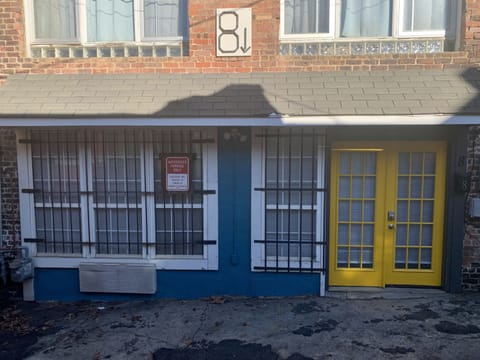 Front of apartment with vacant parking space