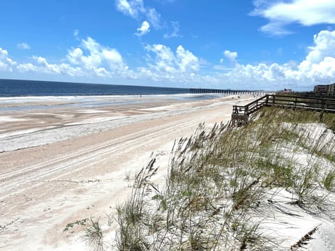 On the beach, sun loungers, beach towels