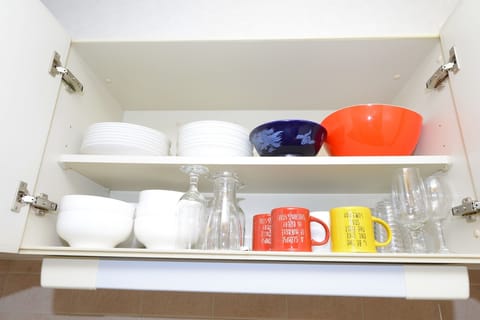 Fridge, microwave, stovetop, cookware/dishes/utensils