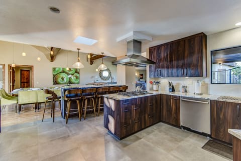 Expansive and Fully Equipped Kitchen with Island Seating