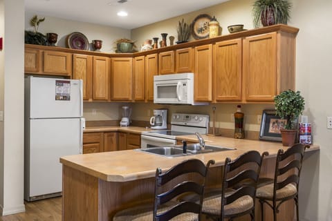 Full Kitchen With Extra Bar Seating