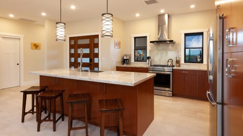 Beautiful kitchen with large island and high end appliances
