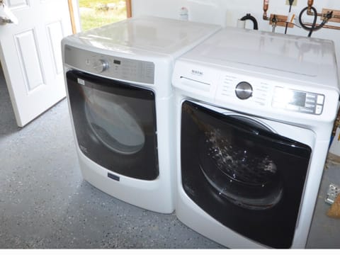 Washer and Dryer located in Garage