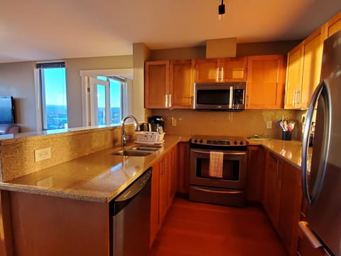 Granite Kitchen with Stainless Appliances  