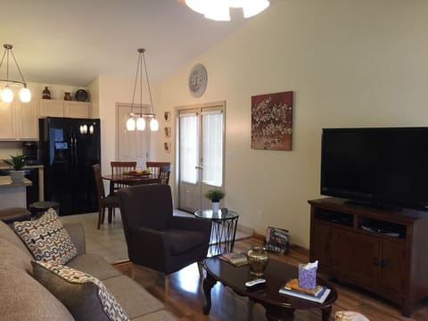 ADJOINING LIVING ROOM The high ceiling gives a open airy feeling.
