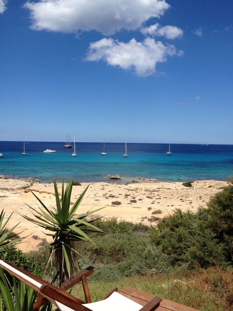 On the beach, sun loungers