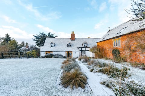 main house view of back garden, main house and hay barn