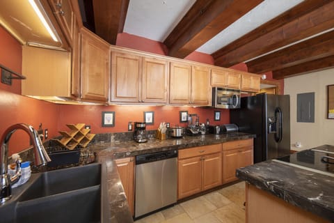 Full kitchen off of the living room.