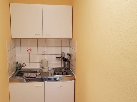 Fridge, microwave, coffee/tea maker, toaster