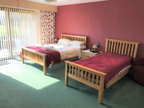 Riverside triple occupancy bed room.