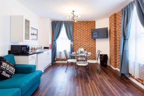 Kitchenette with fridge, microwave, kettle and toaster