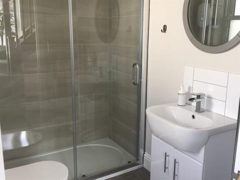 Bathroom | Shower, hair dryer, towels