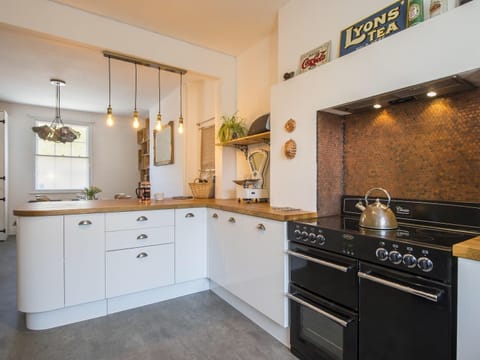 The kitchen is fully equipped to enjoy a meal!