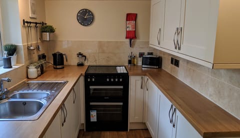 Kitchen - Double Oven, Microwave, Fridge Freezer, Pots & Pans, Glassware, Crockery, Cafetiere. Kitchen Essentials, Complementary Tea, Sugar, Instant & Ground Coffee and a selection of Cereals and Breakfast Items