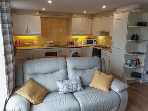 Living Area looking to Dining and Kitchen