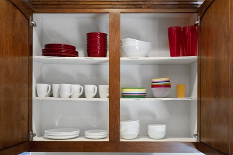 Kitchen is fully stocked with all of your essentials (plates, spoons, forks, pots, pans, etc.)