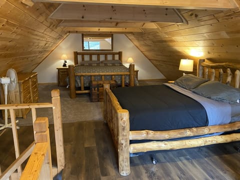 King and queen beds in the loft area. 