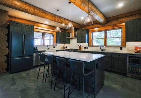 Newly remodeled gourmet kitchen with seating for 4 at the bar. 