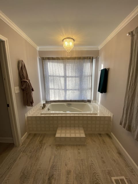 Combined shower/tub, hair dryer, towels, soap