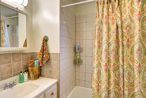 Combined shower/tub, hair dryer, towels, soap