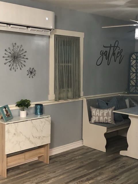 Pull out buffet table for additional seating. Find the chairs under the stairs!