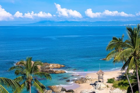 On the beach, sun loungers, beach towels