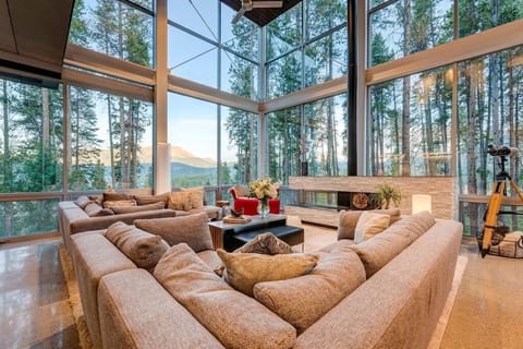 Seventh Heaven's soaring 20' living room windows deliver endless mountain views