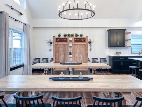 Main level dining area with ample seating including unique throne seats